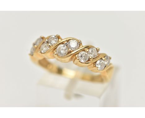 AN 18CT GOLD DIAMOND RING, half eternity style set with a double row of round brilliant cut diamonds, each claw set in a cros