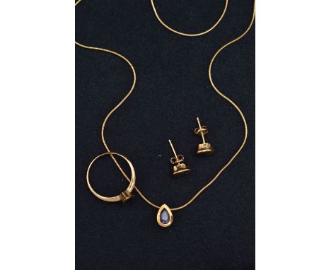 A MODERN 9CT YELLOW GOLD IOLITE EARRRING, NECKLACE AND RING SET, the necklace set with a pear-cut iolite, measuring approxima