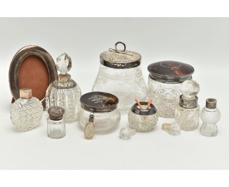 A BOX OF ASSORTED SILVER MOUNTED VANITY JARS AND SCENT BOTTLES, to include a small round glass jar with silver and pique tort