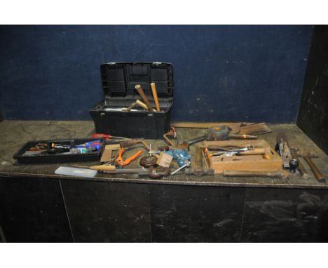 A PLASTIC TOOLBOX AND A TRAY CONTAINING TOOLS including a brace, chisels hammers, saws, a Dronfield plane, a carvers chisel, 