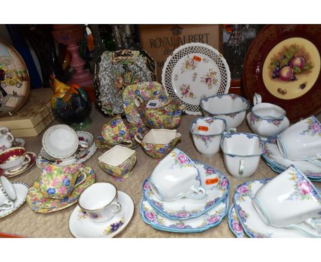 A QUANTITY OF CERAMIC ORNAMENTS including Royal Doulton Balloon Figure character plates, a Royal Winton 'Sweet Pea' tea set, 