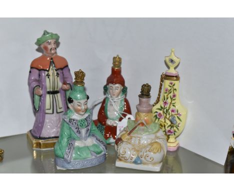 FIVE 20TH CENTURY PORCELAIN SCENT BOTTLES, comprising a yellow Halcyon Days bottle, four Chinese figural bottles - a brown an