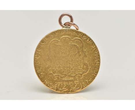 A MOUNTED GUINEA COIN, 1775 George III coin, fitted with a bail and jump ring, approximate gross weight 8.3 grams (condition 