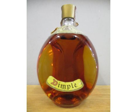 A bottle of Dimple Scotch whisky 