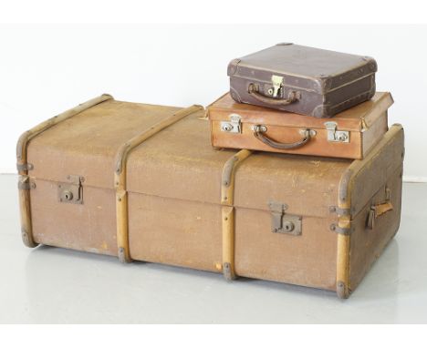 A vintage traveler's chest mounted with bent wood and covered in canvas H33cm, W90cm, D52cm, together with a leather camel co