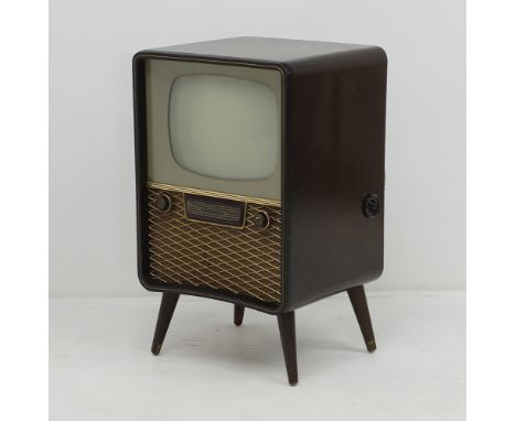 A vintage German Telefunken T.V. model FE 12/43 STF on round tapered splay legs, measuring W50cm, D44cm, H85cm, mid century.
