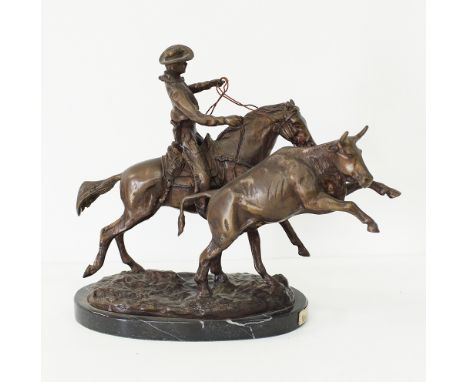 After C.M.Russell, "The Marlboro Man" bronzed metal sculpture, marked Limited edition /1200, depicting a cowboy on horse herd