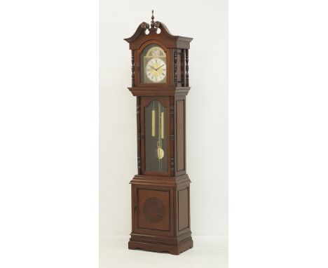 A Chinese style grandfather clock in red cherry finish, has brass weights and pendulum behind a glass door, H215cm, 20th cent