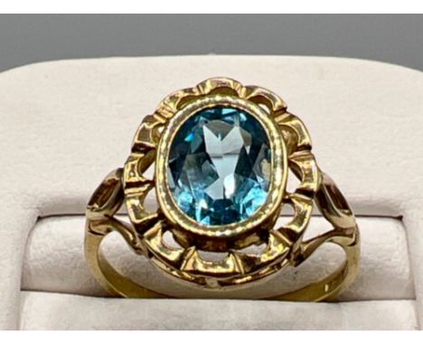 Ladies 9ct gold blue topaz ring. Comprising of oval shaped stone 2.3G size K