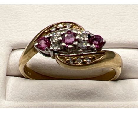 Ladies 9ct gold pink stone and diamond cluster ring. Size N 2.6g