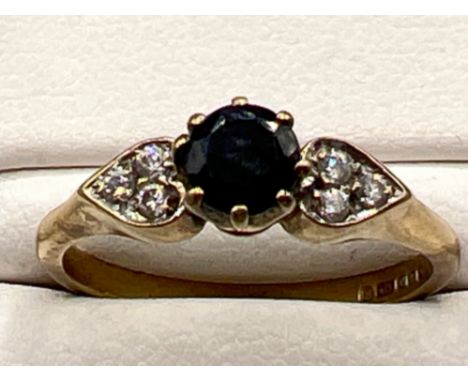 Ladies 9ct gold sapphire and cz ring. 2.1g size M1/2