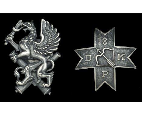 Latvia, Republic, Latvian Artillery Badge, silver, featuring a Griffin rampant brandishing a sword surmounted on crossed cann