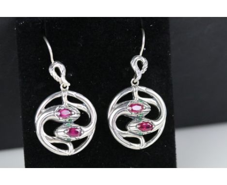 Pair of silver and ruby snake style earrings, cased 