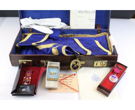Leather case containing a small quantity of masonic collectables &amp; ephemera to include enamel jewels, sash, gloves, ticke