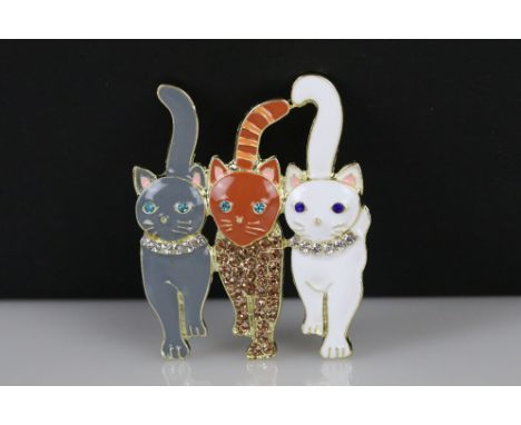 Gilt and enamel cat brooch 