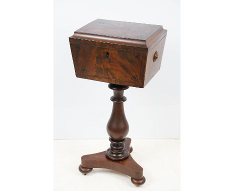 19th Century Victorian mahogany pedestal tea caddy. The lid opening to reveal two glass tea bowls and four lead lined compart