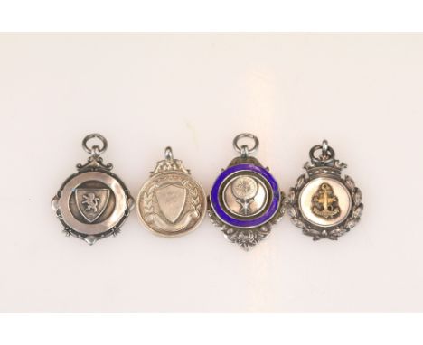 Four Silver Hallmarked Fob Medals, all dating between 1920's and 1930's, one with blue enamel inlay and another set with a go