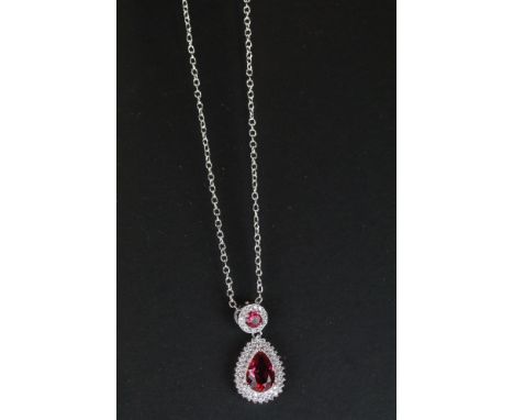 Silver CZ and faux ruby pendant necklace in a pear shape 