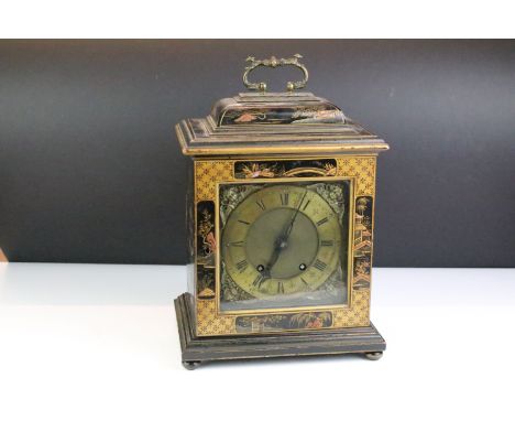 19th Century Chinoiserie bracket clock having a round dial with roman numerals to the chapter ring set within a lacquered cas