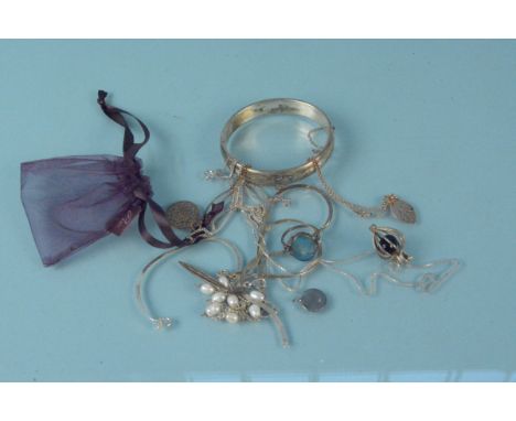 Mixed silver jewellery including a bangle, a ring and various necklaces