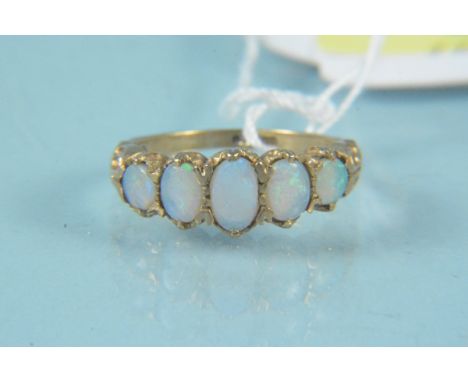 A 9ct gold five stone opal ring, size K, weight approx 2g