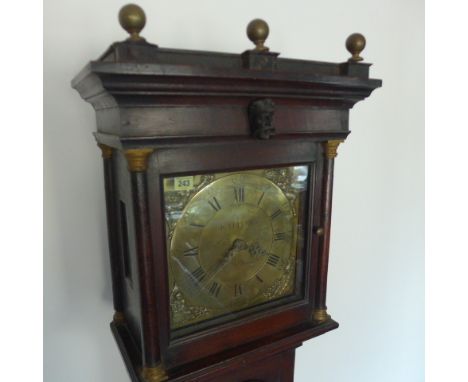 An 18th century 30 hour longcase clock with an 11 inch square brass dial signed Katterns, Thrapston in an oak case standing 1