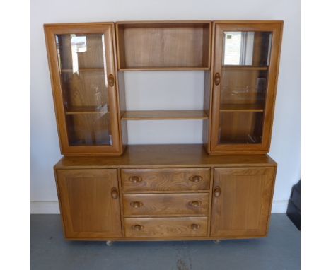 An Ercol Windsor living cupboard - as new - Width 160cm x 160cm - retails online at £3,429 