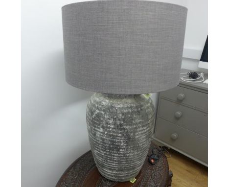 A good quality rustic large table lamp and shade 