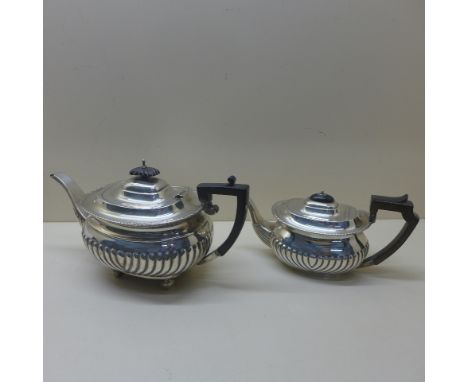 Two silver teapots Chester 1906/07 Barker Brothers Ltd - approx weight 20.3 troy oz and Sheffield 1904/05 Atkins Brothers - a