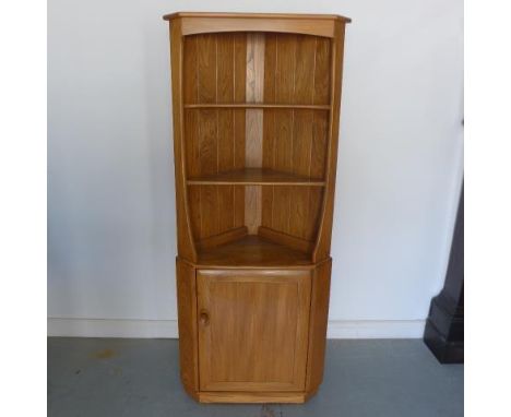 An Ercol Windsor corner cabinet - as new - retails online around £2,000 