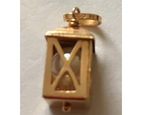 18ct gold lantern with a pearl inside, 1.3gms in total