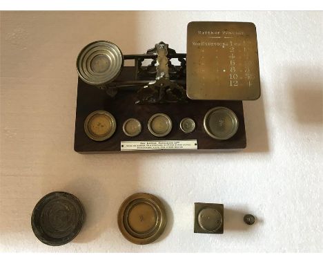 S.Mordan and company, London, brass and mahogany postage scales.