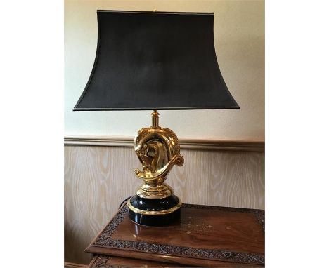 A brass horses head table lamp 64cms h