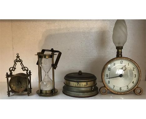 Three novelty clocks and a brass egg timer 