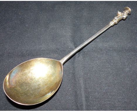 A white metal spoon with planished bowl and apostle finial, 7"