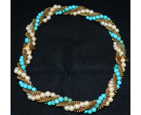 A pair of 18 carat hallmarked gold rope twist bracelets combining to form a choker / necklace by B R Ltd, each with an entwin