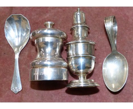A silver capstan pepper mill, London 1994; a silver pepper pot, caddy spoon and baby's spoon