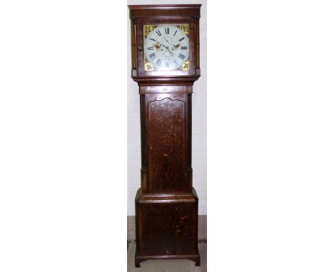 An early C19th oak longcase clock with mahogany cross banding, square top hood with turned side pillars, arched full length d