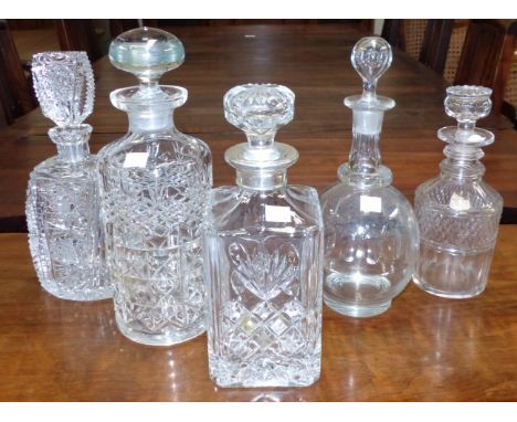 A silver rim decanter, other decanters and decorative glassware