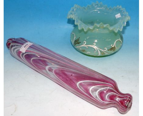 A 19th century Nailsea glass rolling pin, 15½"; an opalescent glass vase