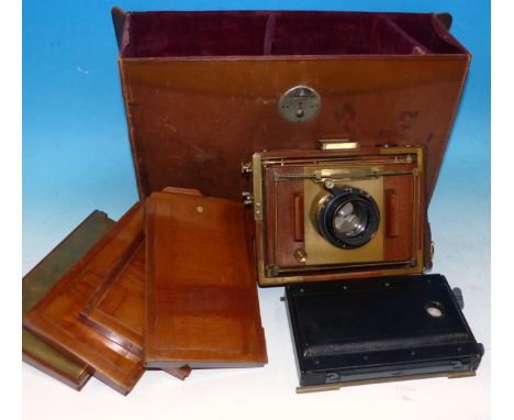 An Ernemann (Dresden)Tropical 3¼" x 5½" plate camera, complete with Ross 6.5" f4.5 lens, cross aperture leather bellows viewe