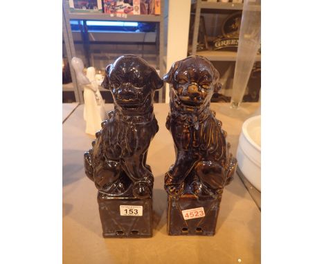 Pair of ceramic Dogs of Fo  CONDITION REPORT: Both in good to excellent condition with no apparent damage.