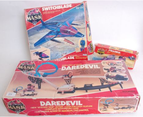 KENNER; A collection of three vintage Kenner MASK boxed toys to include Switchblade, Piranha & Daredevil, each with original 