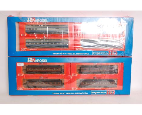 RIVAROSSI: Two vintage railway trainset Rivarossi boxed sets (one set still sealed and unopened). 14289 and 3014.

NOTE: This