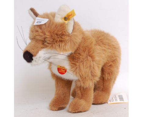 STEIFF; An original Steiff Snorry Fox 670327 stuffed teddy bear, complete with tag and button to ear.