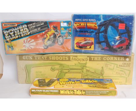 GAMES: A collection of 4x vintage toys / games to include: Corgi Walkie Talkies M2010, Chad Valley 'Gun That Shoots Around Th