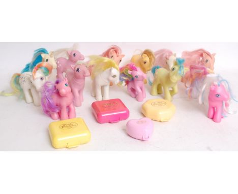 A quantity of original vintage Hasbro My Little Pony dolls along with several vintage Polly Pocket playsets.