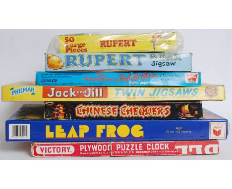 GAMES & PUZZLES: A collection of vintage games and puzzles to include two Rupert games, Paddington Bear, Jack & Jill, Leap Fr