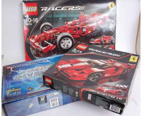 LEGO; Collection of three vintage Lego sets; 8674 Racers, 8156 (unopened) and 3804 Lego Mindstorm Robotics Invention System.
