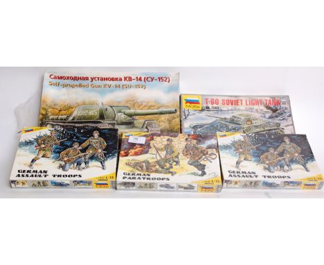 MODEL KITS: 1970's Russian model kits - German Paratroopers, German Assault Troops (x2), A Soviet Light Tank and a KV14.